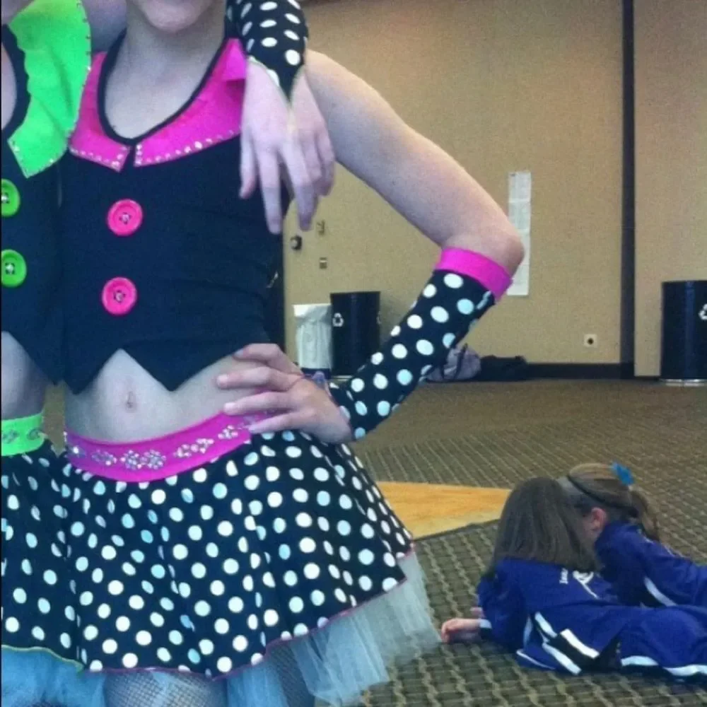 Custom made Jazz Polka Dot Black and Pink dance costume with swarovski crystals.